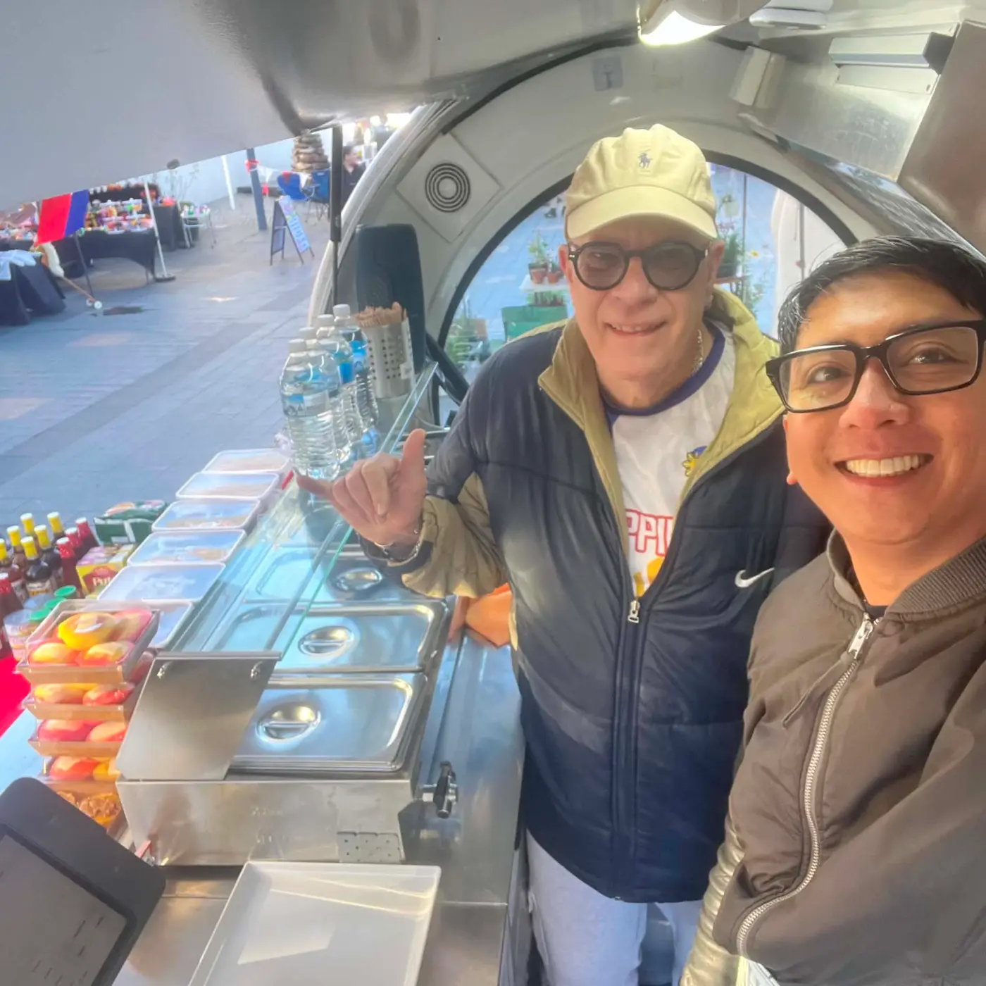 Arcee and Kulander inside the food trailer